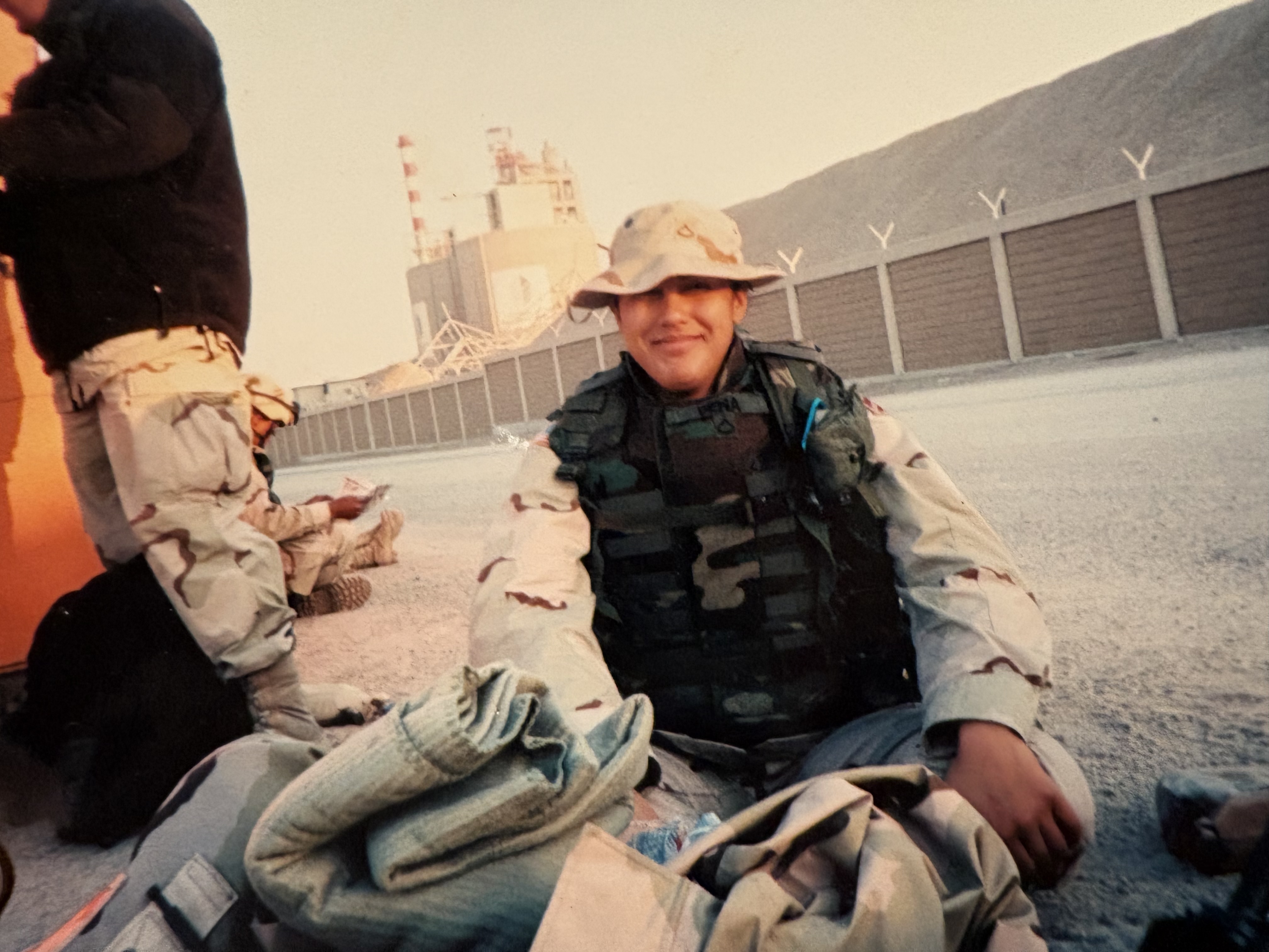 Sue Fisher in service with a soldier